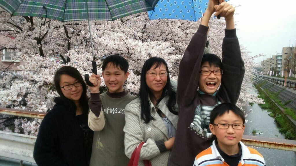 Veronica (left) with mother and brothers